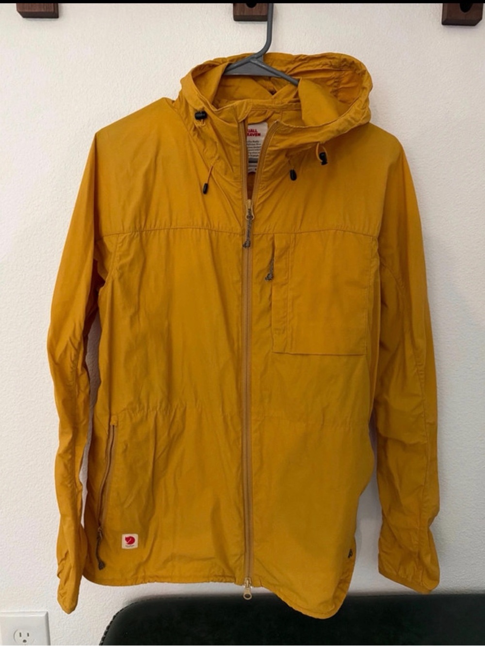 Fjallraven Women’s Hooded Windbreaker Jacket in Mustard